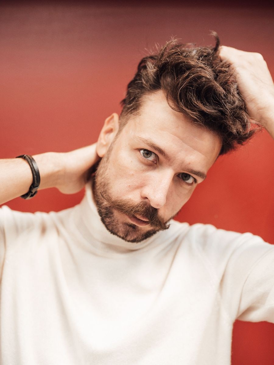 Male model with groomed skin and a healthy complexion